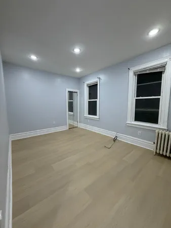 an empty room with windows