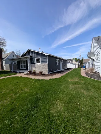 a view of a house with a big yard
