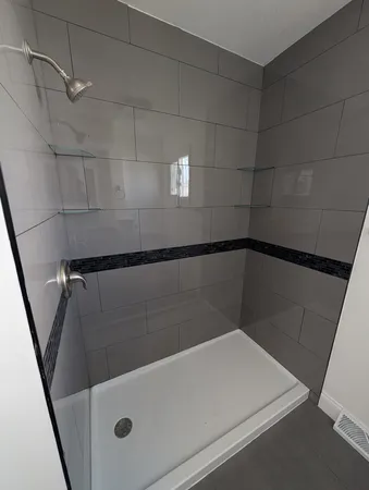 a bathroom with a sink toilet and mirror