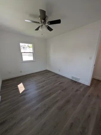 a view of an empty walk in closet