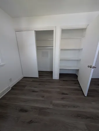 a view of a room with racks on the wall