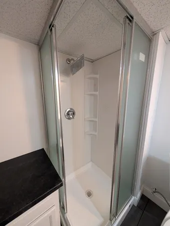 a bathroom with a sink and mirror