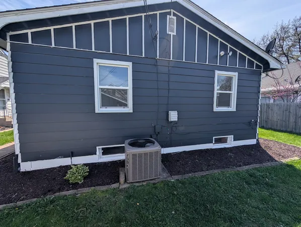 a house view with a backyard space