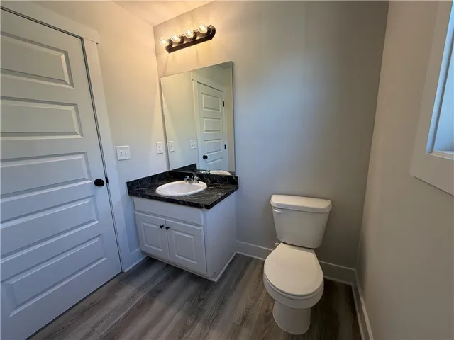 a bathroom with a sink and a toilet