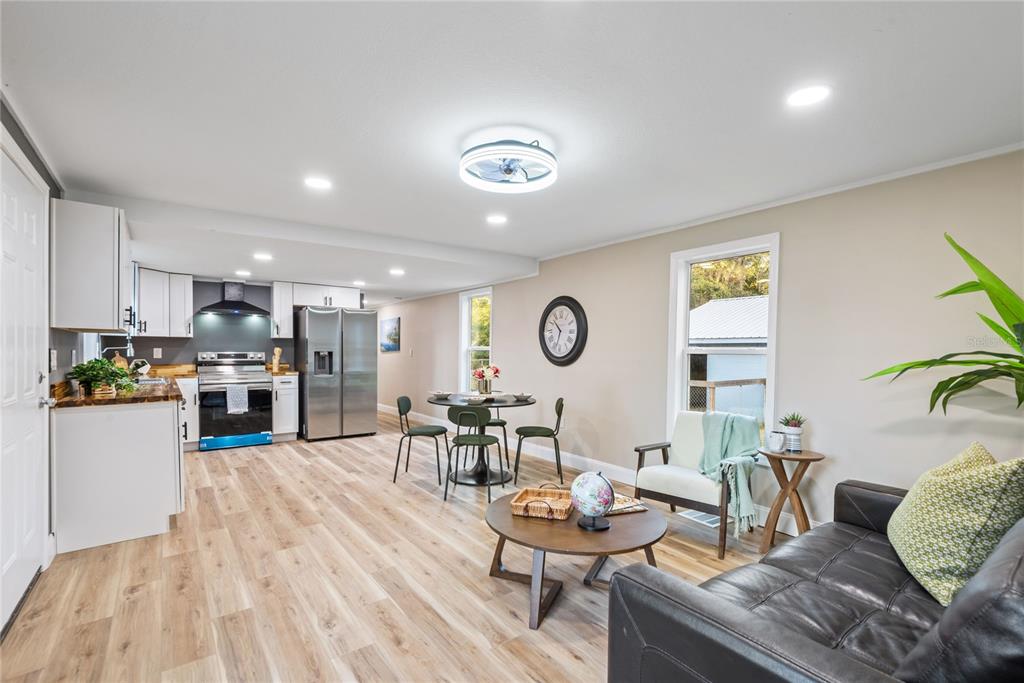 6455 West Cardinal Street Homosassa, FL 34446 - Photo 19 of 38 a living room with furniture and kitchen view