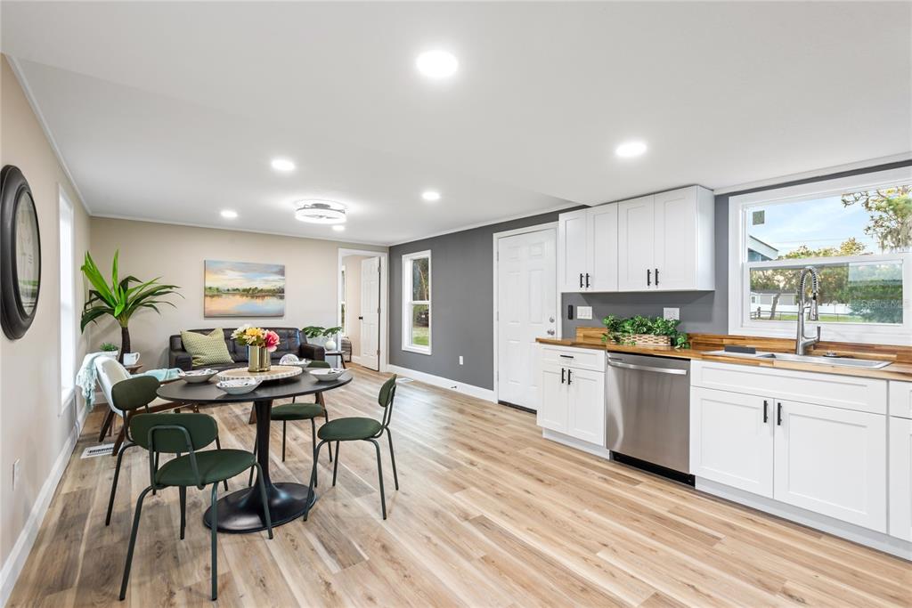 6455 West Cardinal Street Homosassa, FL 34446 - Photo 26 of 38 a kitchen with a table and chairs in it