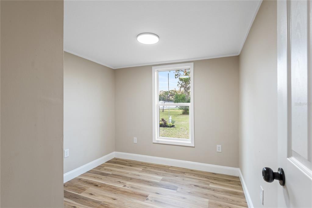 6455 West Cardinal Street Homosassa, FL 34446 - Photo 27 of 38 an empty room with windows