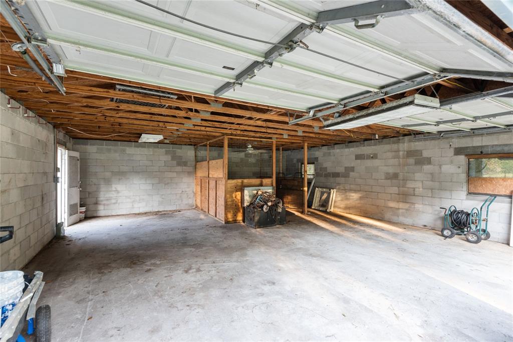 6455 West Cardinal Street Homosassa, FL 34446 - Photo 10 of 38 a view of empty room with wooden walls