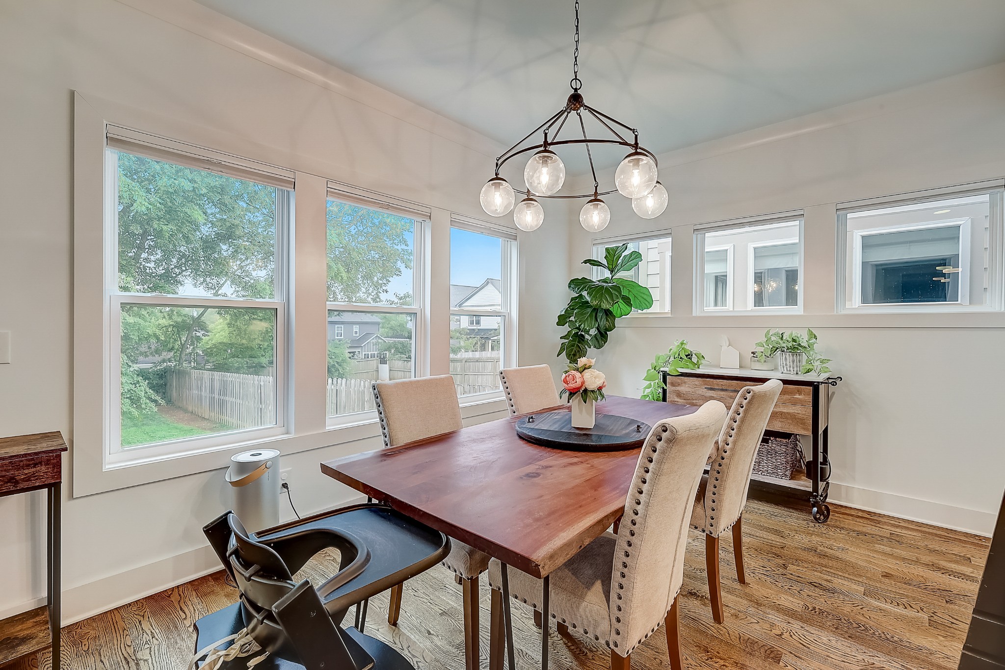 2010 Sheridan Road Nashville, TN 37206 - Photo 18 of 62 a view of a dining room with furniture wooden floor and chandelier