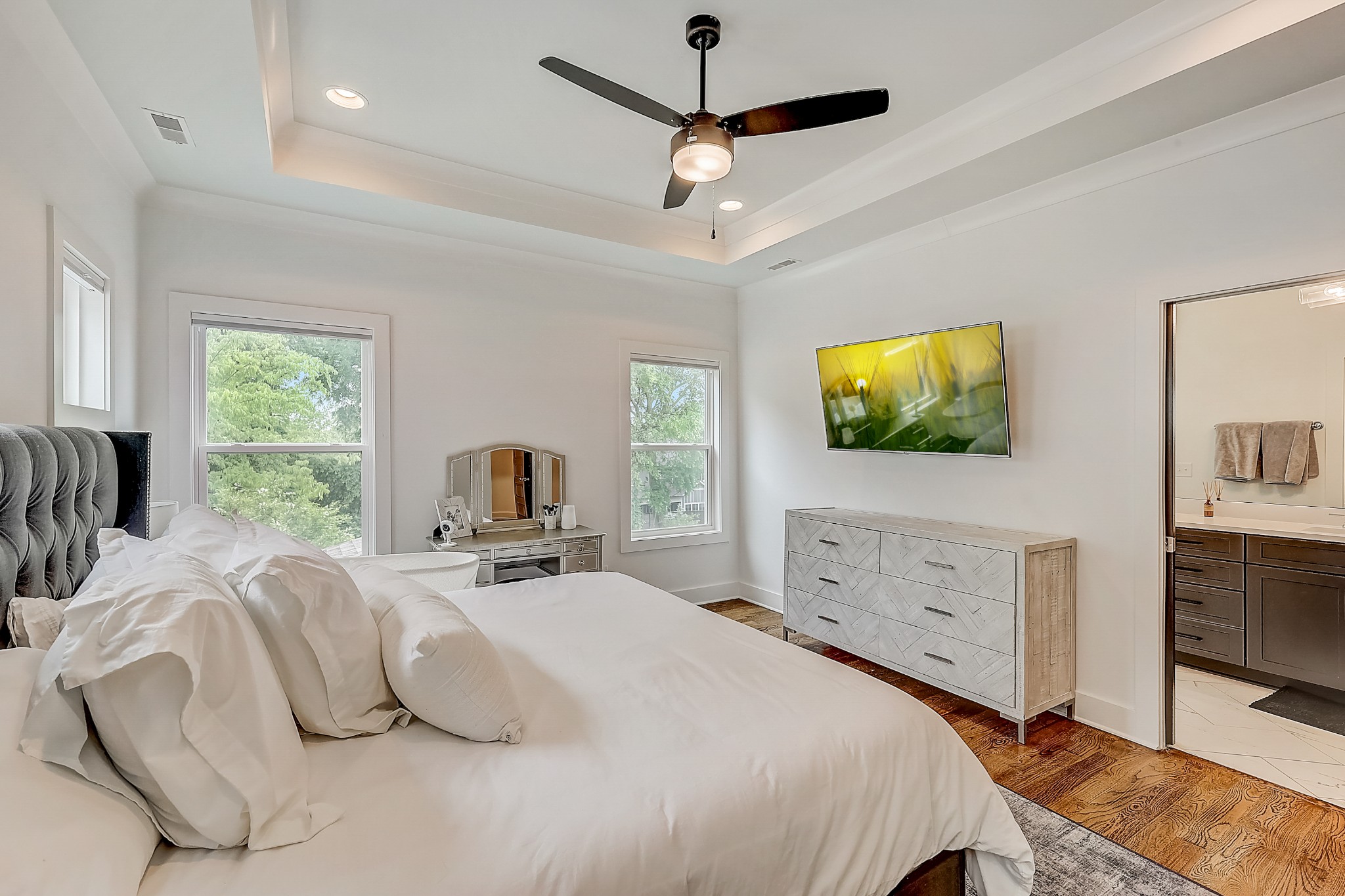 2010 Sheridan Road Nashville, TN 37206 - Photo 33 of 62 a bedroom with a bed a window and a flat screen television