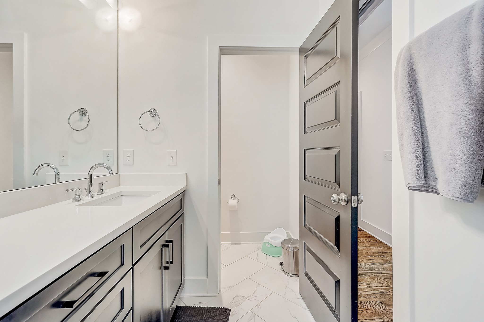 2010 Sheridan Road Nashville, TN 37206 - Photo 37 of 62 a spacious bathroom with a double vanity sink and mirror