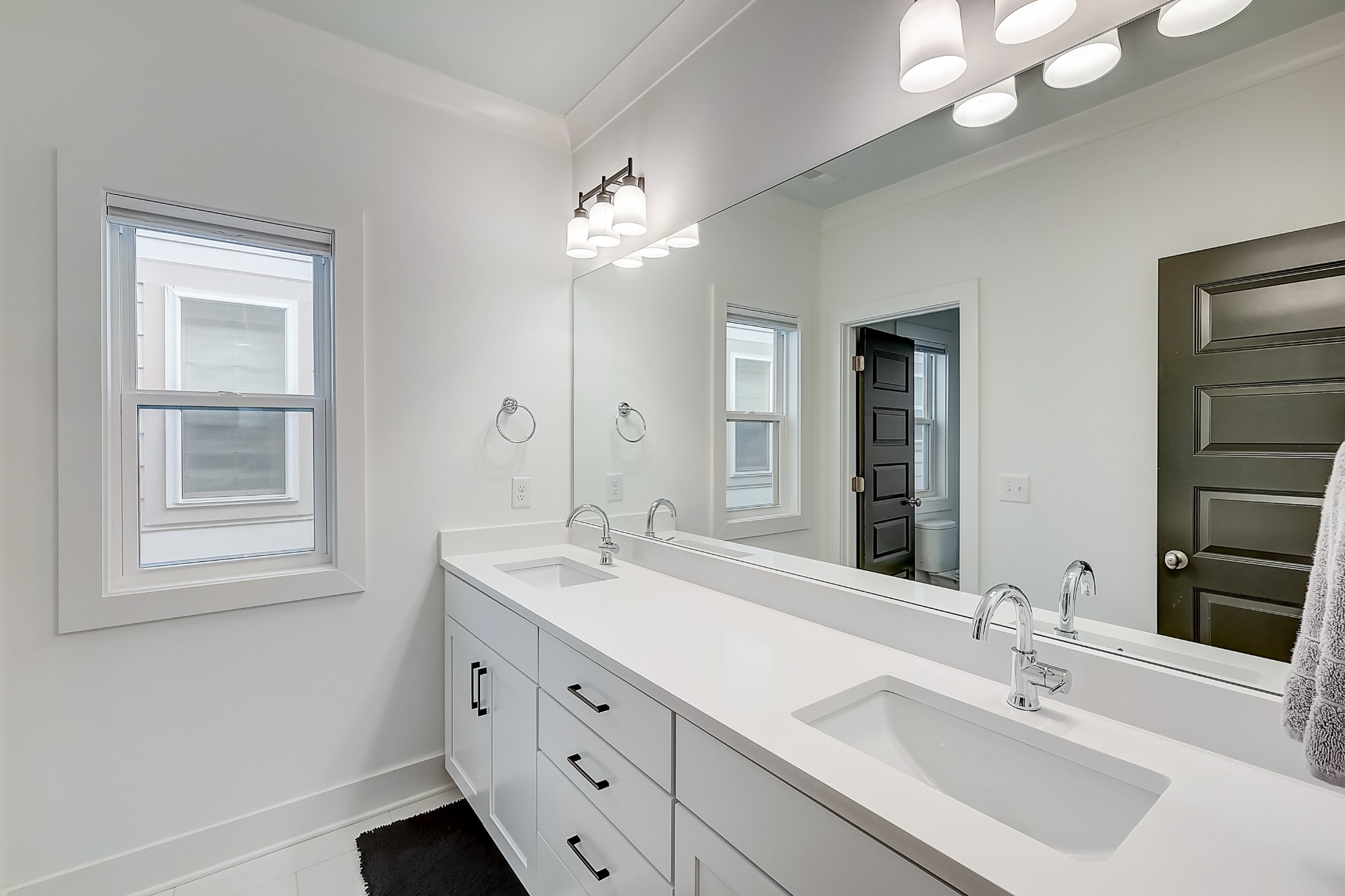 2010 Sheridan Road Nashville, TN 37206 - Photo 43 of 62 a bathroom with double vanity sink a vanity and mirror