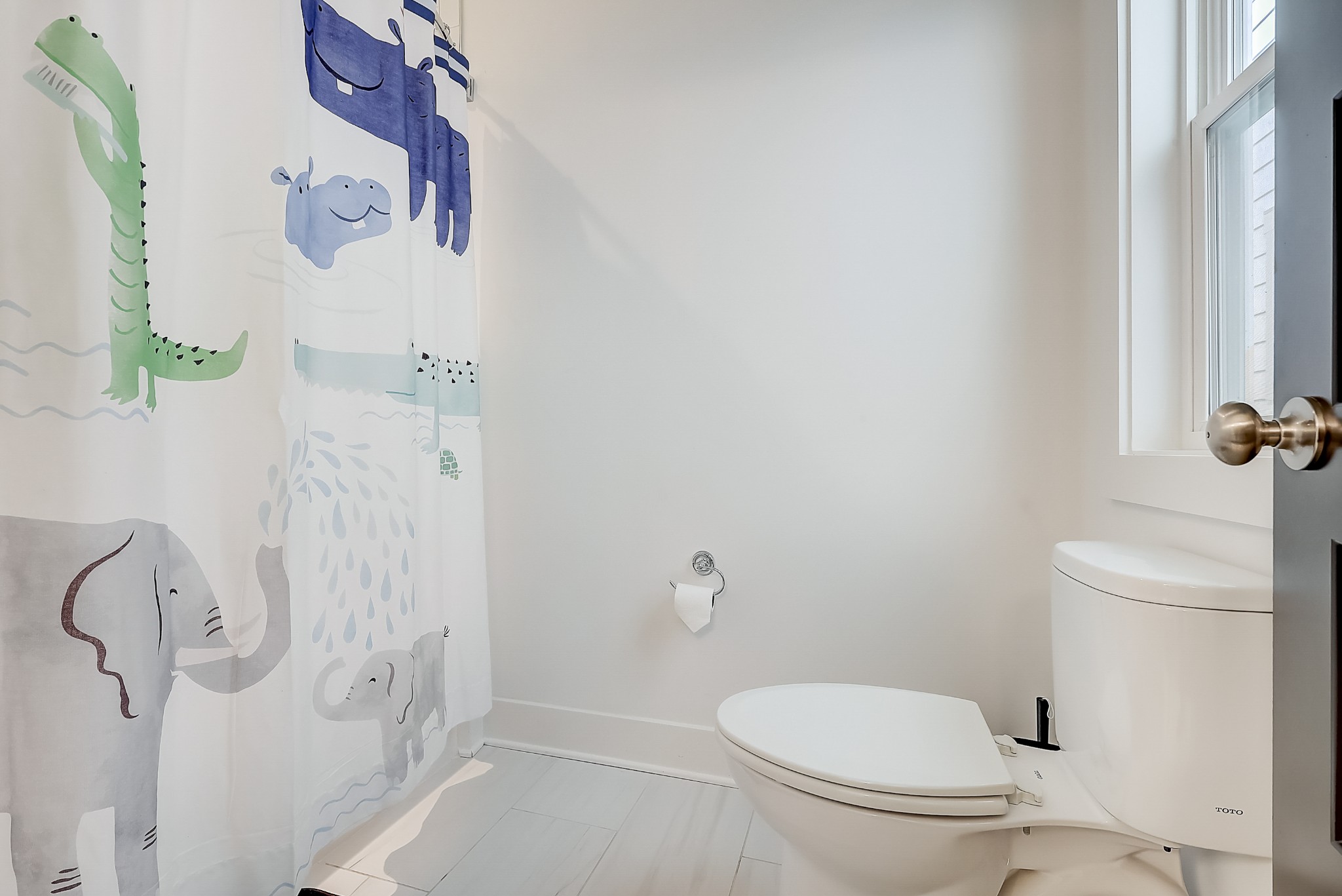 2010 Sheridan Road Nashville, TN 37206 - Photo 44 of 62 a white toilet sitting next to a bathroom sink