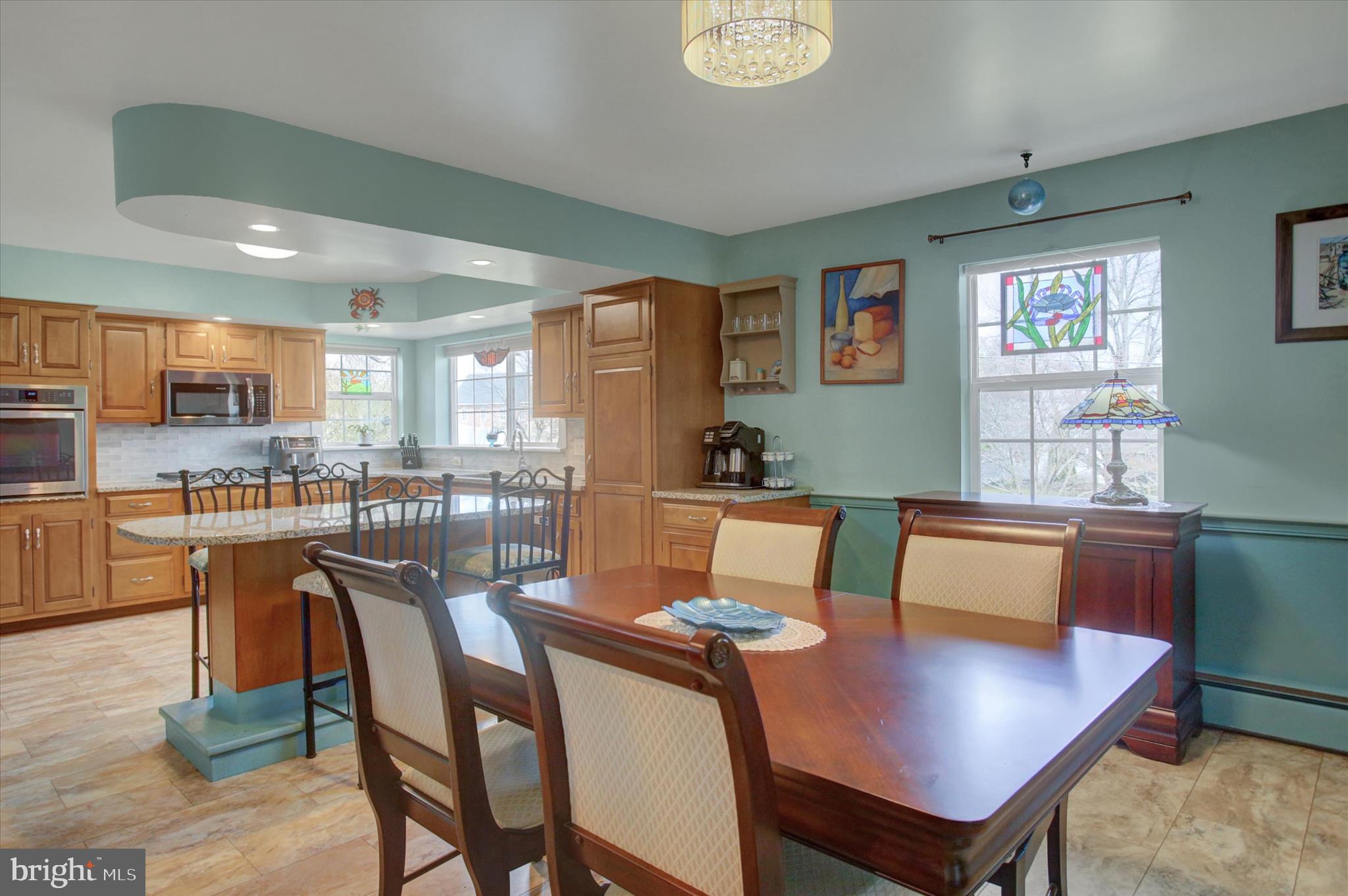 6612 Moulstown Road Hanover, PA 17331 - Photo 12 of 84 a view of a dining room with furniture and a kitchen