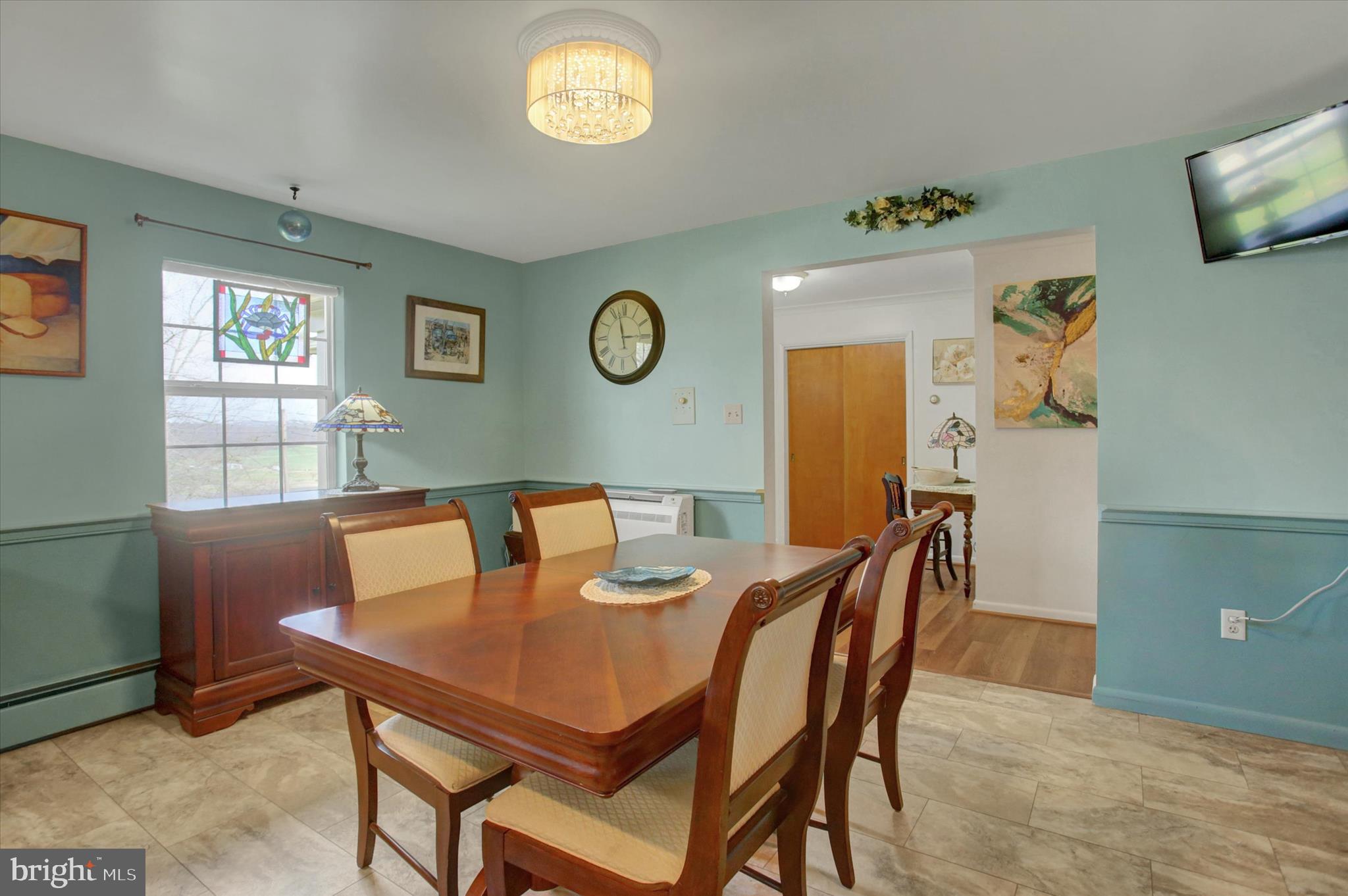 6612 Moulstown Road Hanover, PA 17331 - Photo 20 of 84 a view of a dining room with furniture and a large window
