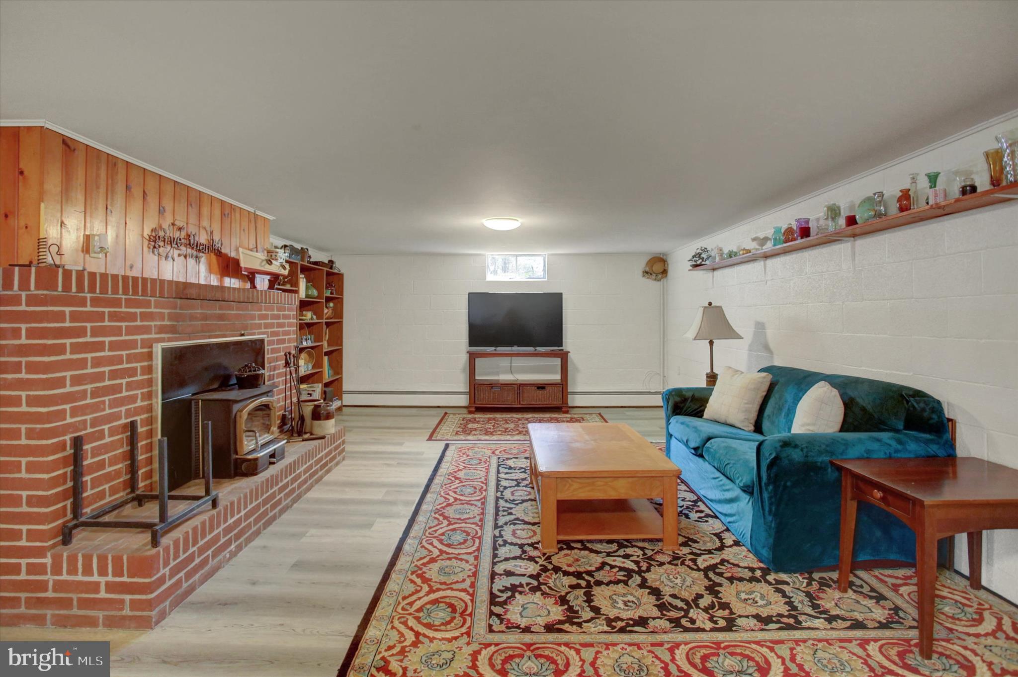 6612 Moulstown Road Hanover, PA 17331 - Photo 39 of 84 a living room with furniture and a fireplace