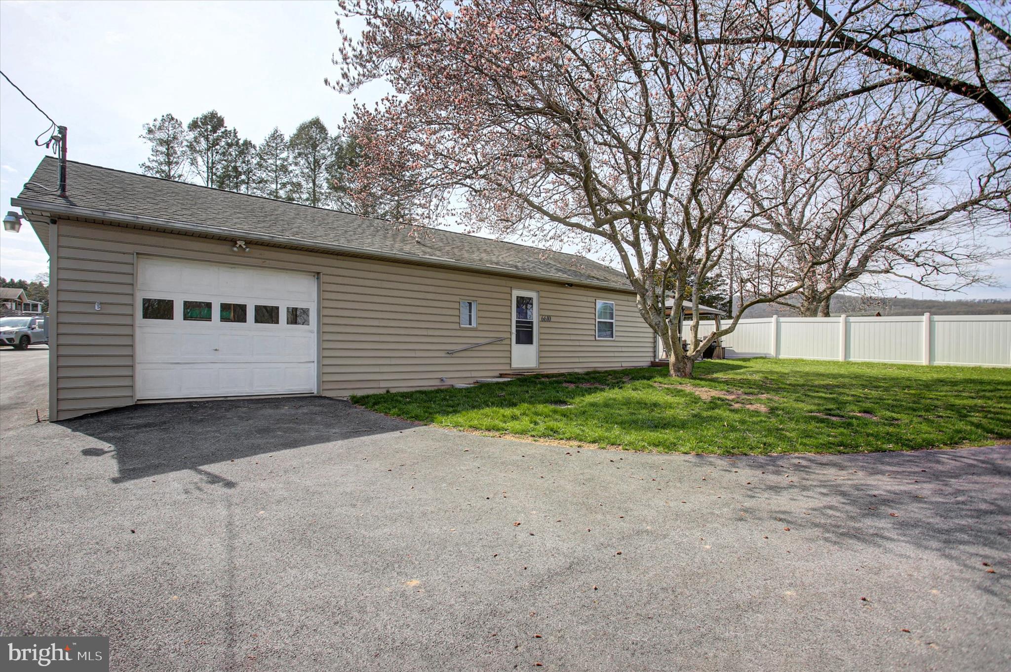 6612 Moulstown Road Hanover, PA 17331 - Photo 63 of 84 a view of a house with a yard and garage