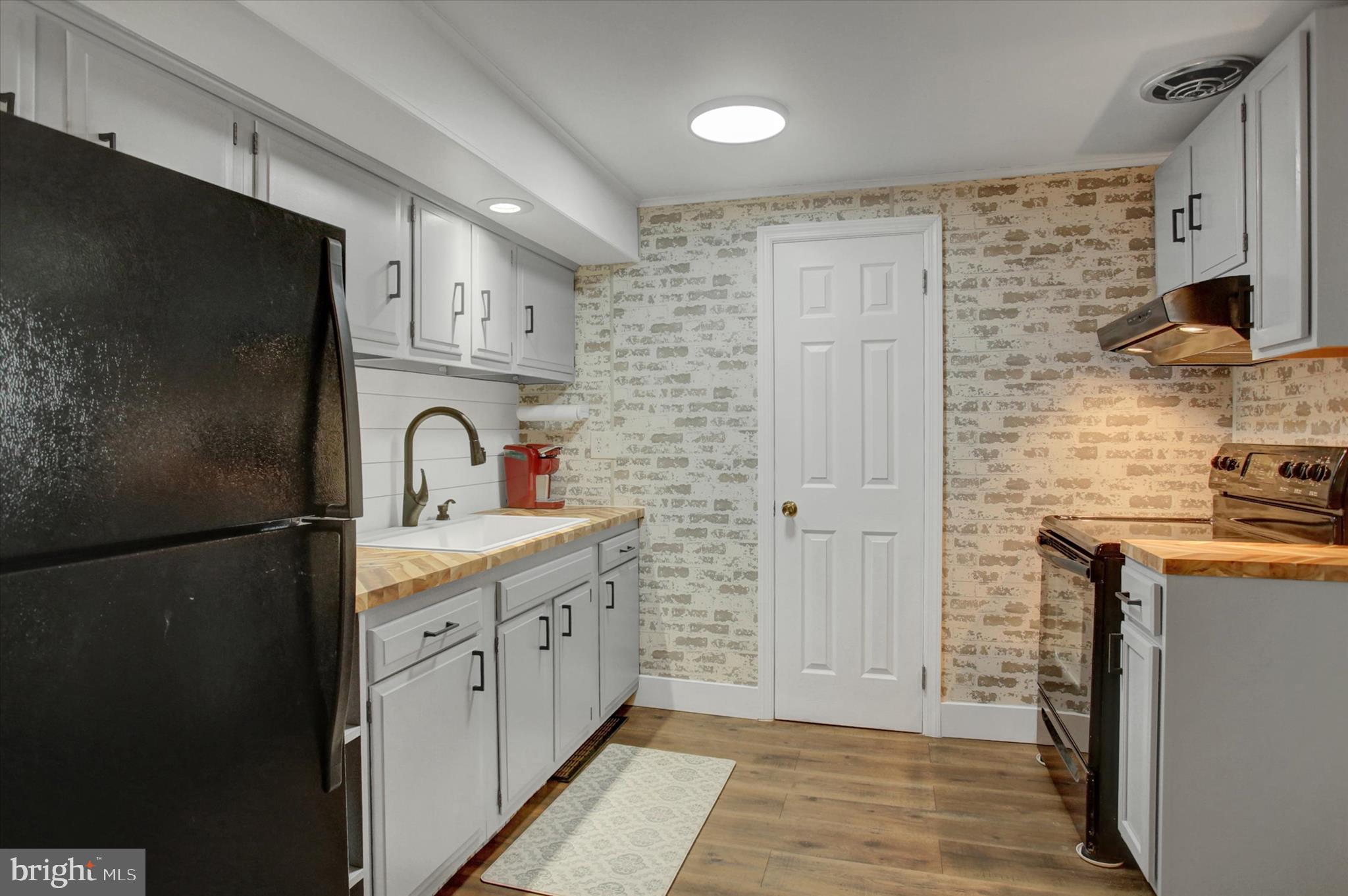 6612 Moulstown Road Hanover, PA 17331 - Photo 69 of 84 a kitchen with stainless steel appliances a refrigerator and a sink