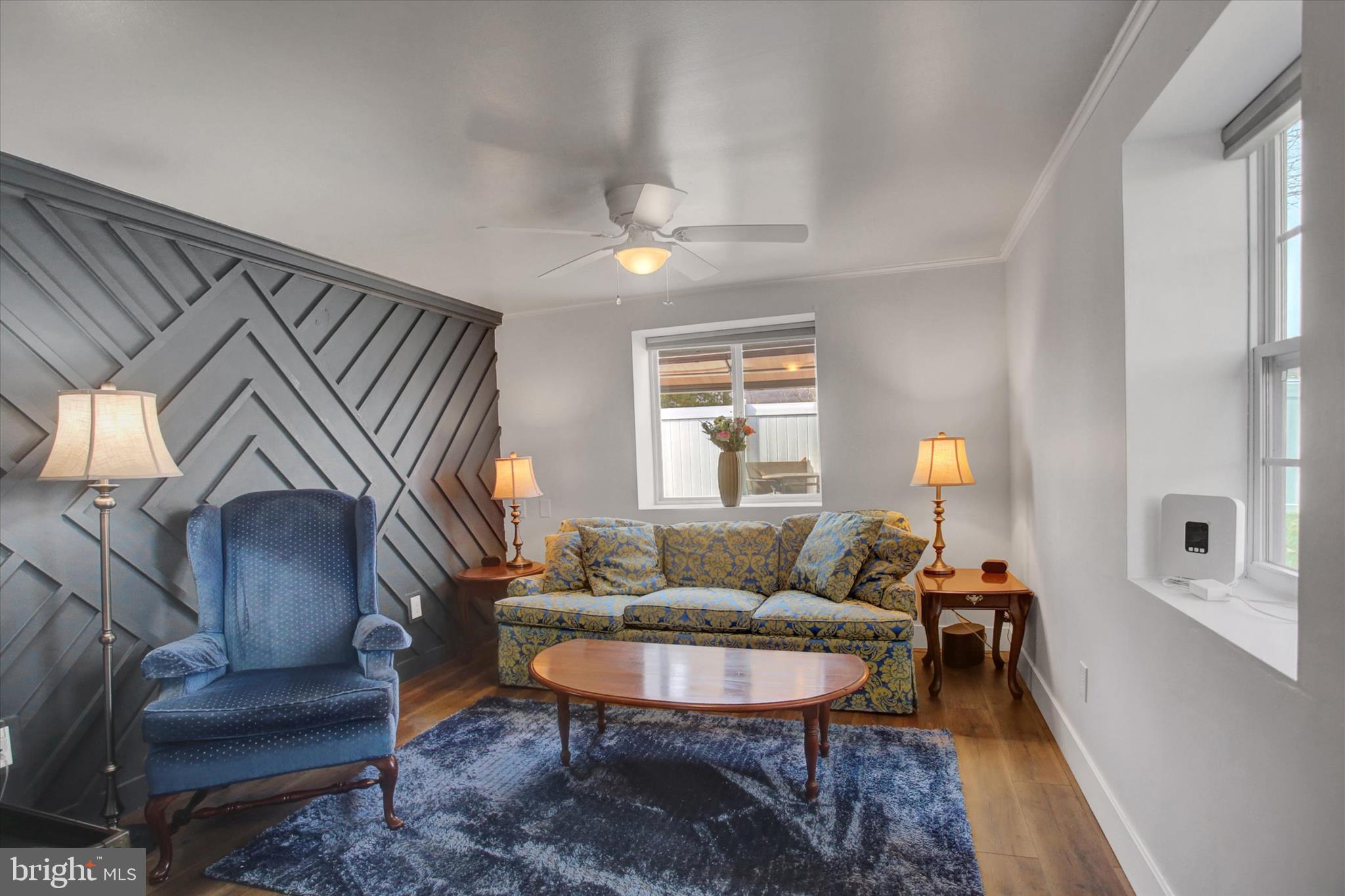 6612 Moulstown Road Hanover, PA 17331 - Photo 75 of 84 a living room with furniture a ceiling fan a rug and a window