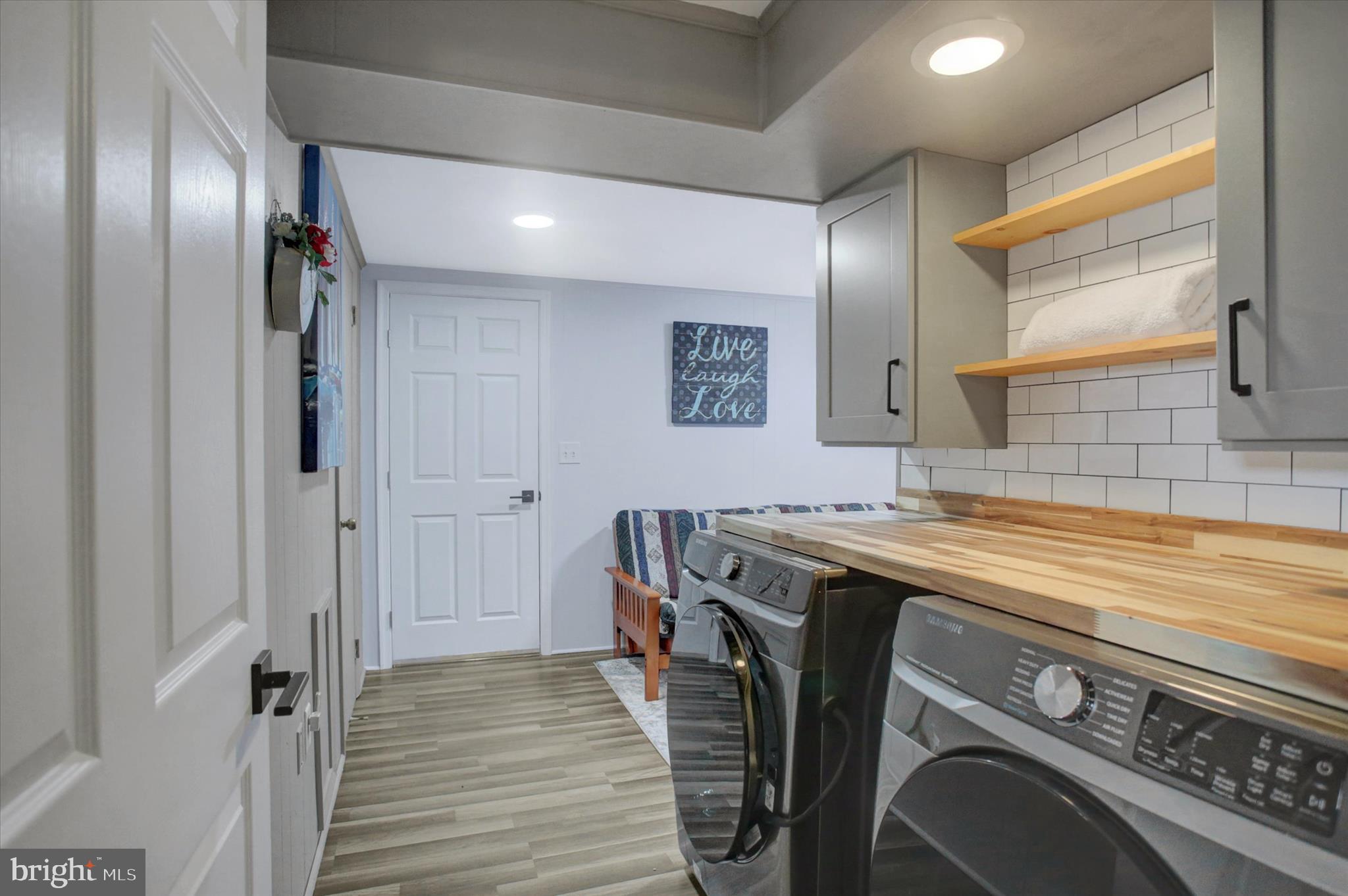 6612 Moulstown Road Hanover, PA 17331 - Photo 77 of 84 a view of a kitchen with stainless steel appliances granite countertop a sink and wooden floor