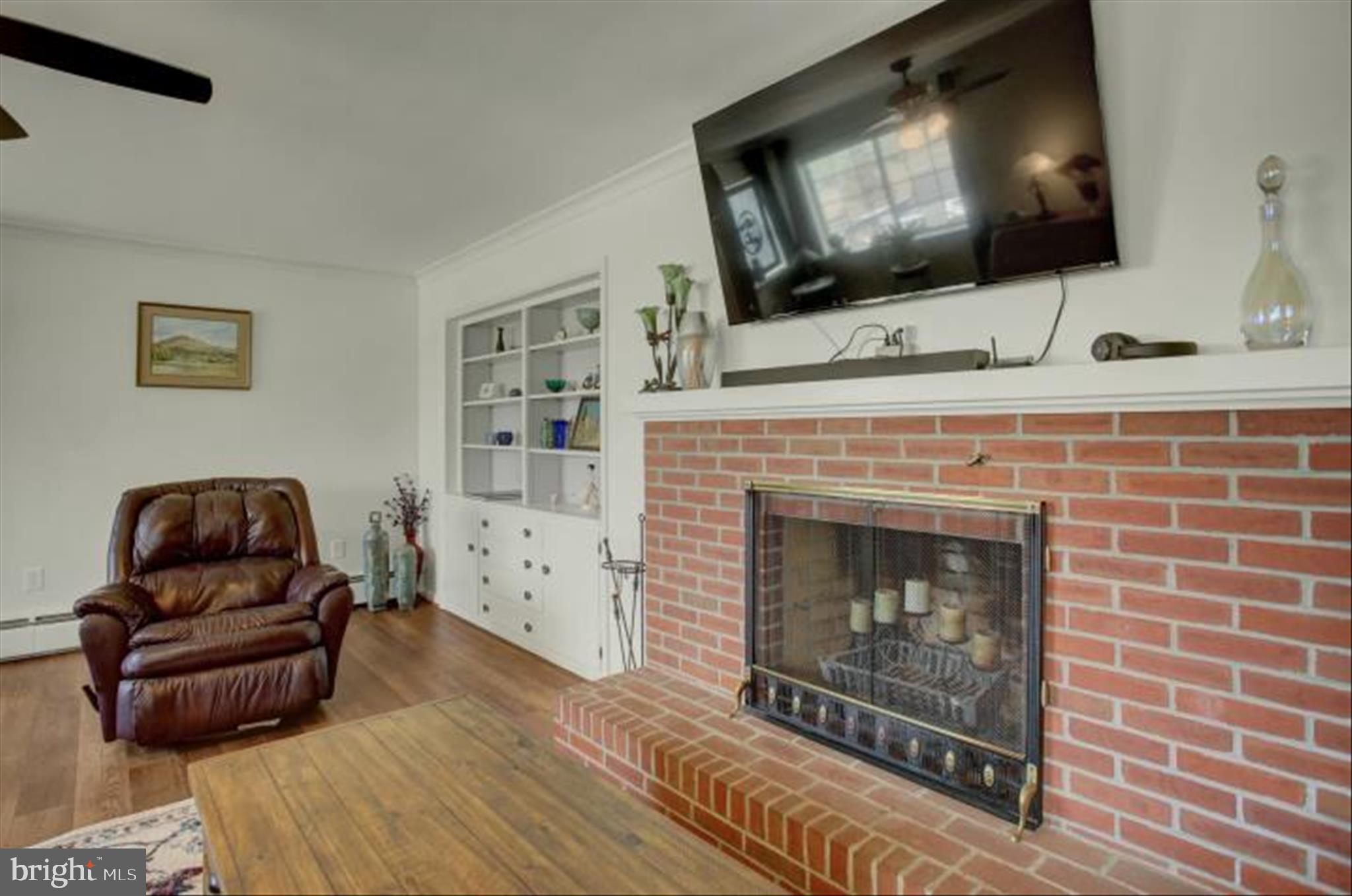 6612 Moulstown Road Hanover, PA 17331 - Photo 10 of 84 a living room with furniture and a fireplace