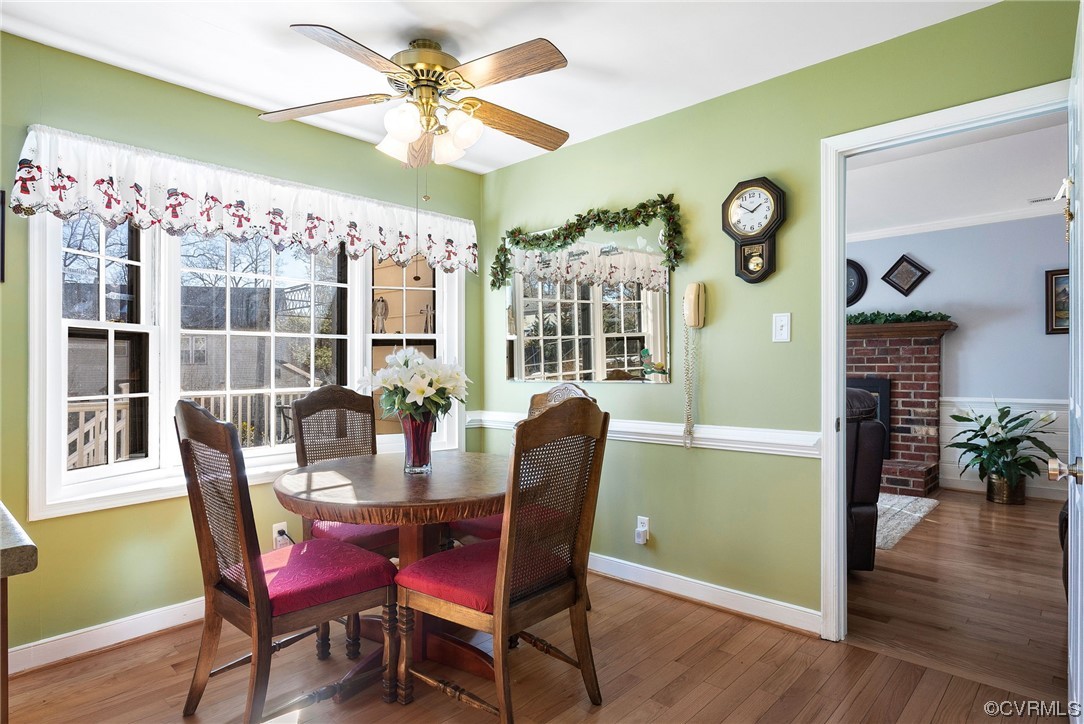 13019 Queensgate Road Midlothian, VA 23114 - Photo 13 of 29 a dining room with furniture window and wooden floor
