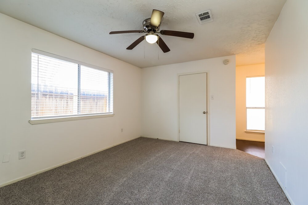 13411 Reads Court Houston, TX 77015 - Photo 9 of 16 a view of an empty room with a window