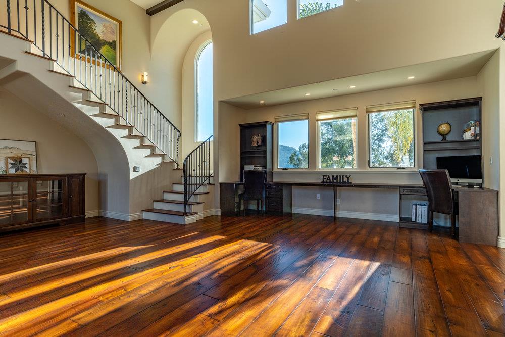 2985 Day Road Gilroy, CA 95020 - Photo 22 of 100 a living room with fireplace furniture and a wooden floor