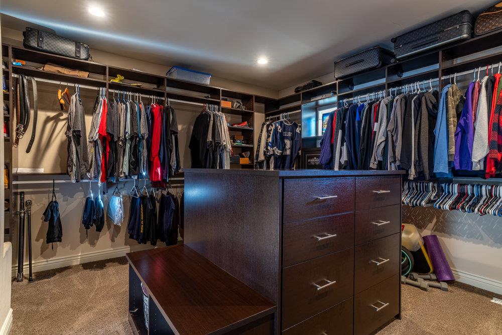 2985 Day Road Gilroy, CA 95020 - Photo 48 of 100 a view of walk in closet with clothes and shoes