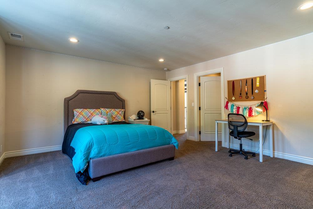2985 Day Road Gilroy, CA 95020 - Photo 62 of 100 a bedroom with a bed and a tv
