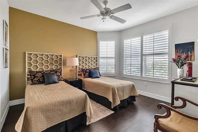 a view of a ocean with a table chairs and a swimming pool