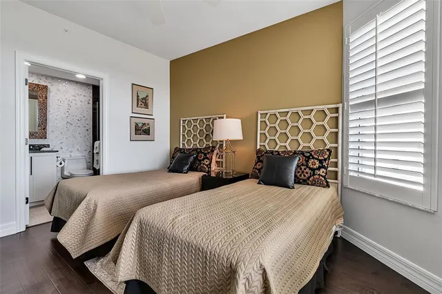 an aerial view of a house with outdoor space and lake view