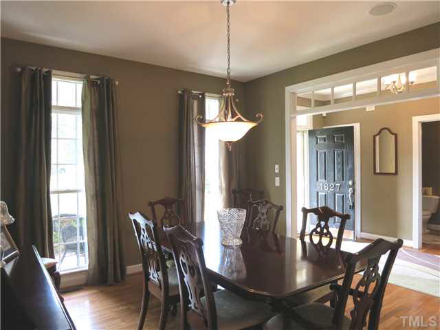 1627 Weatherford Circle Raleigh, NC 27604 - Photo 5 of 25 The formal Dining Rm is off the Foyer and features a pewter light fixture.