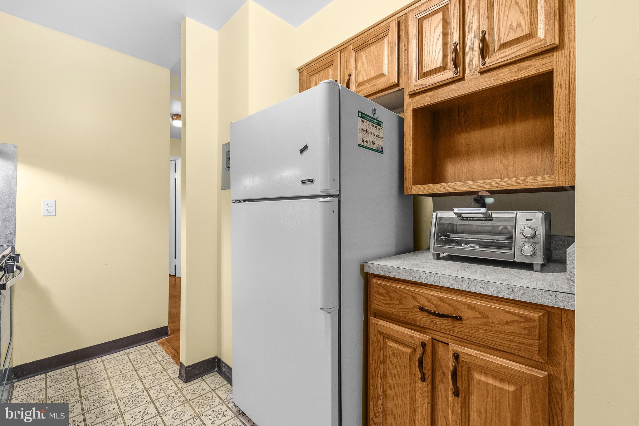 2305 Greenery Lane, Unit T23 Silver Spring, MD 20906 - Photo 13 of 40 a utility room with dryer and washer