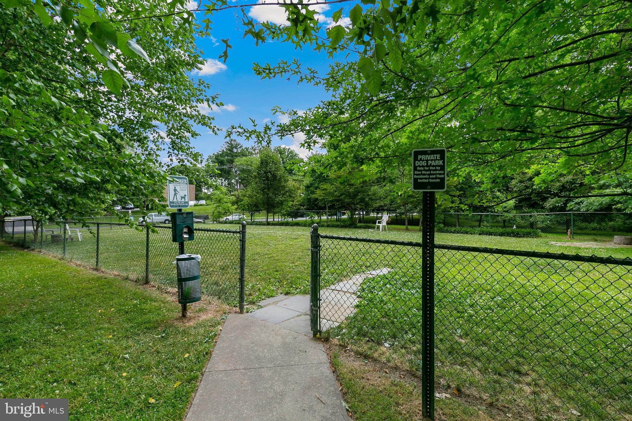 2305 Greenery Lane, Unit T23 Silver Spring, MD 20906 - Photo 39 of 40 a view of a park with large trees