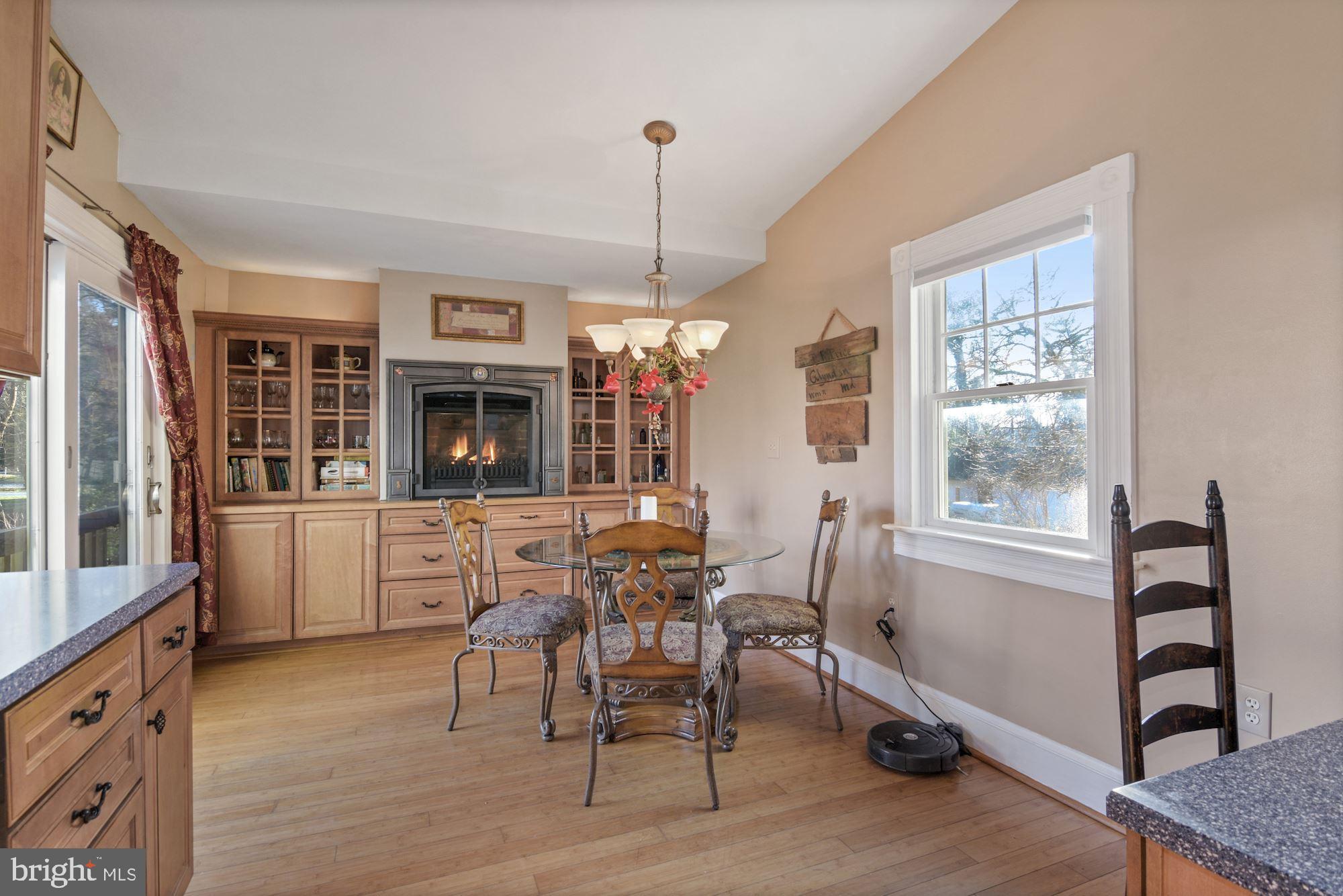 4801 Butler Road Glyndon, MD 21136 - Photo 18 of 80 Breakfast area with built-ins & gas fireplace