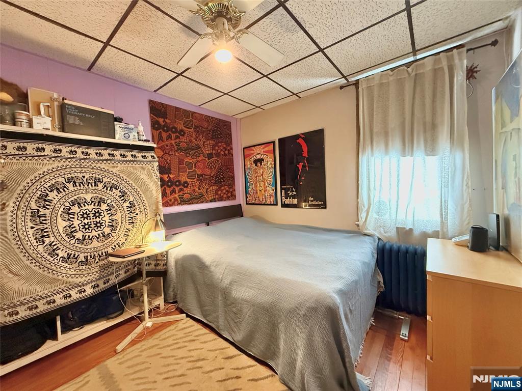 799 2nd Street Secaucus, NJ 07094 - Photo 15 of 48 a bedroom with a bed and a dresser