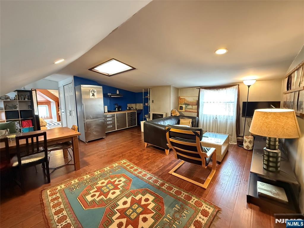799 2nd Street Secaucus, NJ 07094 - Photo 17 of 48 a living room with furniture and a wooden floor