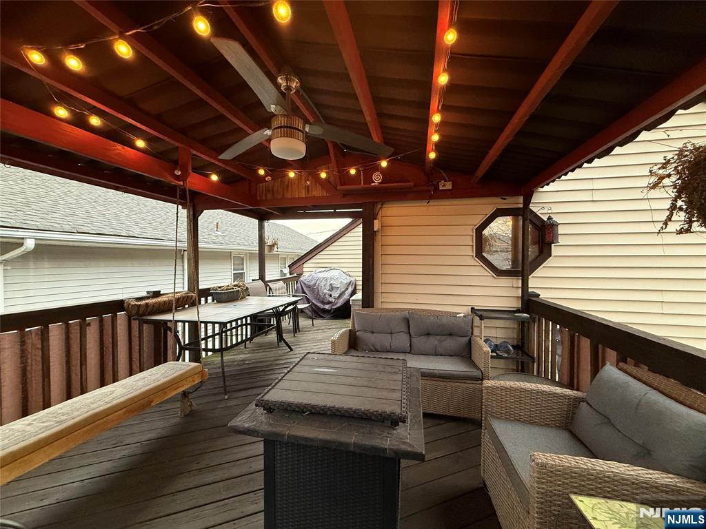 799 2nd Street Secaucus, NJ 07094 - Photo 25 of 48 a outdoor living space with patio furniture and a wooden floor