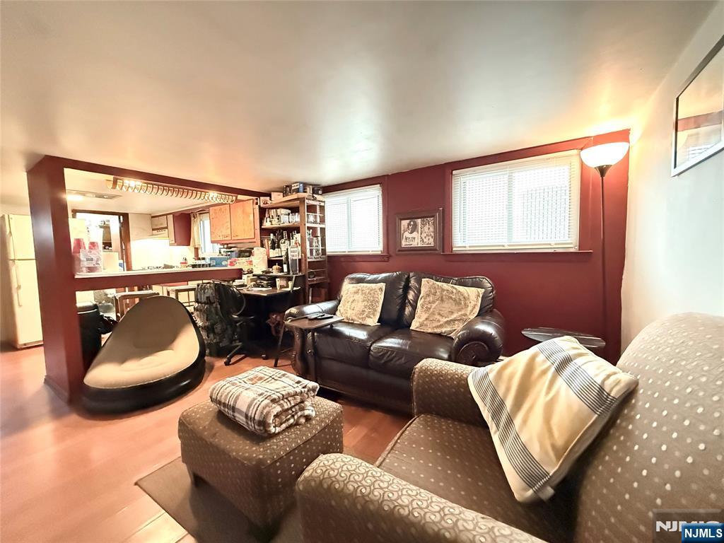 799 2nd Street Secaucus, NJ 07094 - Photo 37 of 48 a living room with furniture and a large window