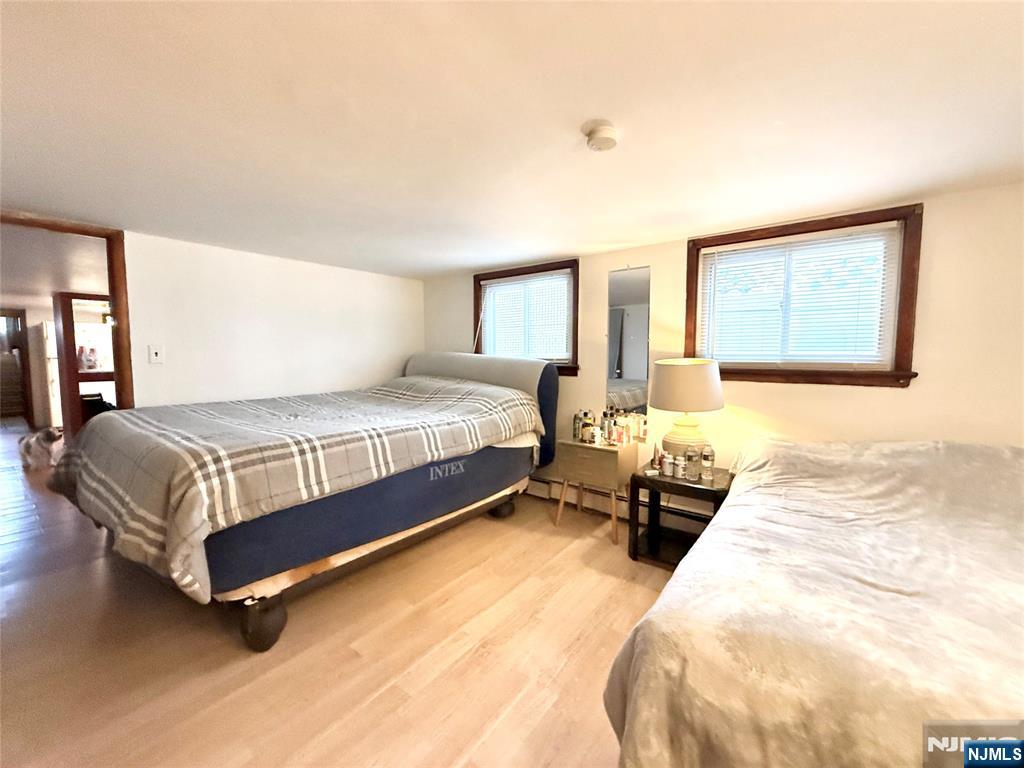 799 2nd Street Secaucus, NJ 07094 - Photo 39 of 48 a bedroom with a bed and window