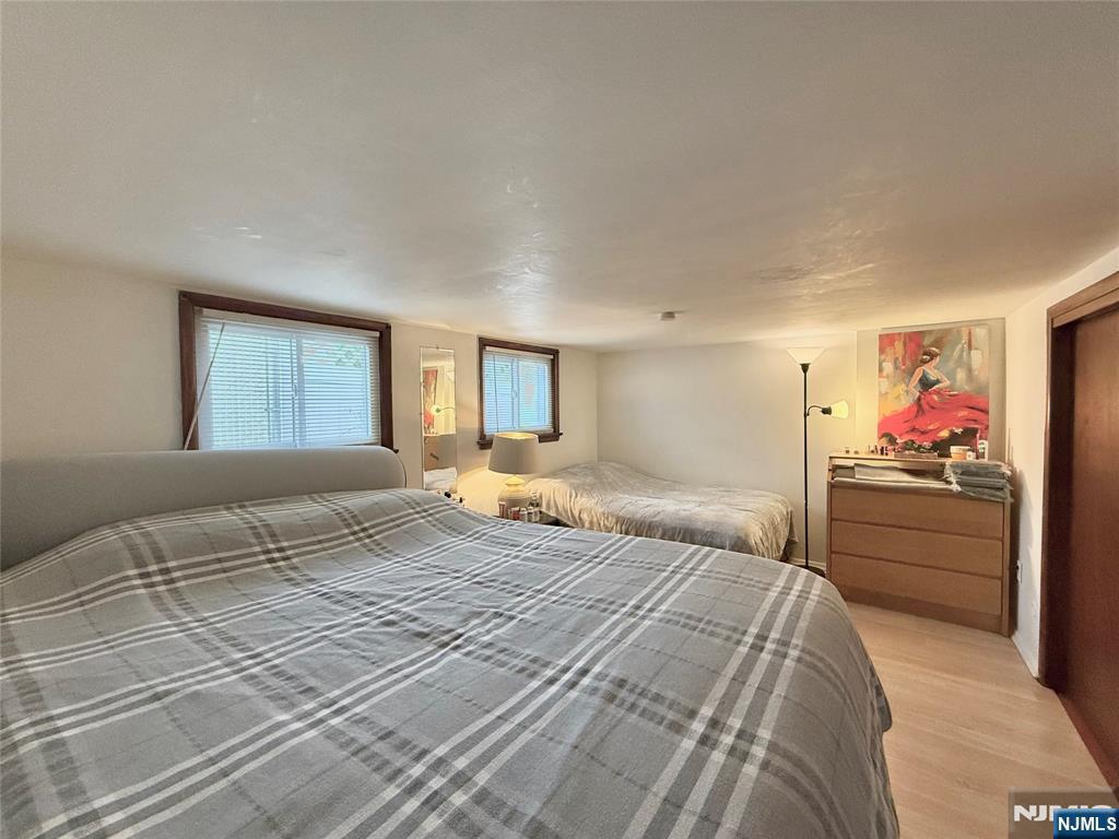 799 2nd Street Secaucus, NJ 07094 - Photo 40 of 48 a bedroom with a bed and a dresser