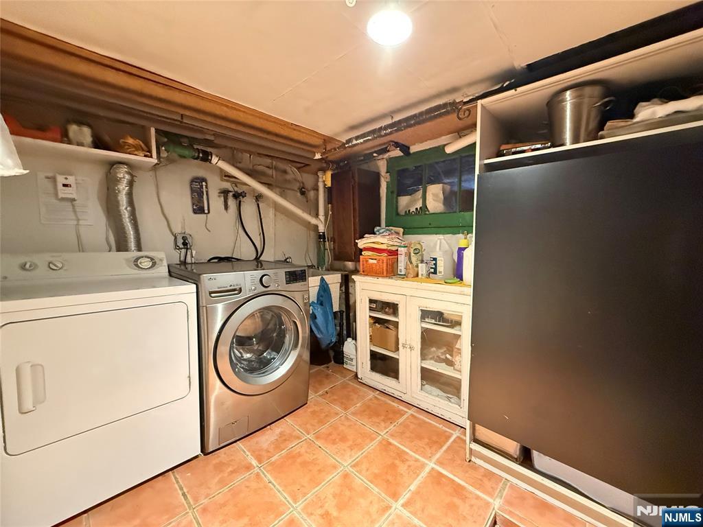 799 2nd Street Secaucus, NJ 07094 - Photo 44 of 48 a utility room with dryer and washer