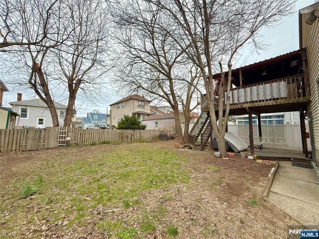 799 2nd Street Secaucus, NJ 07094 - Photo 46 of 48 a view of a house with a yard covered in snow