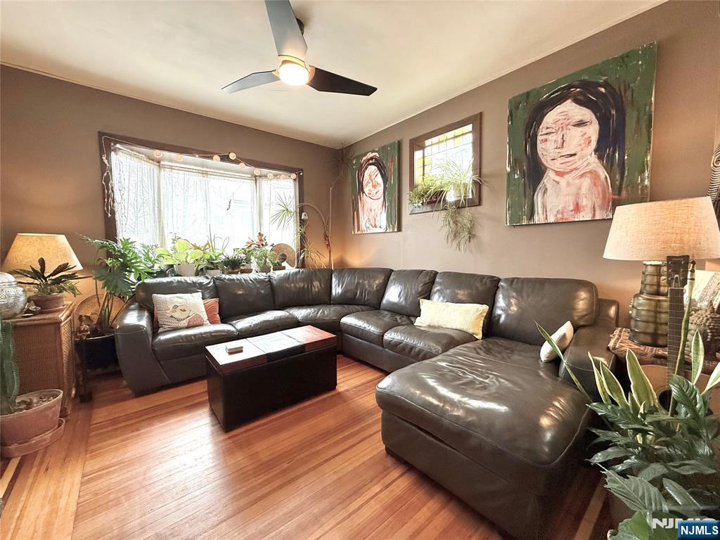 799 2nd Street Secaucus, NJ 07094 - Photo 7 of 48 a living room with furniture and a large window