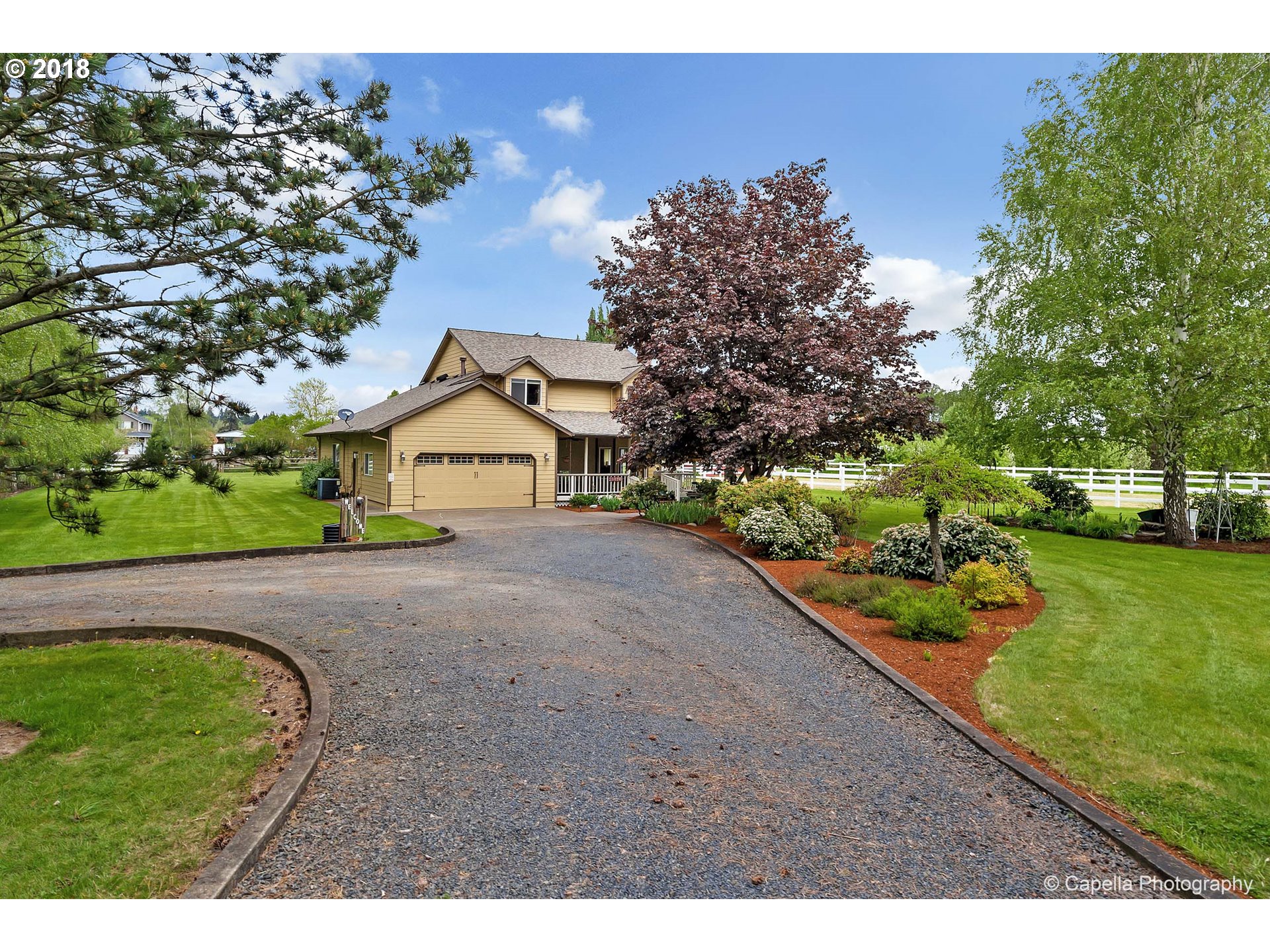 11675 Hazelgreen Road Northeast Silverton, OR 97381 - Photo 1 of 32 a view of a house with a yard
