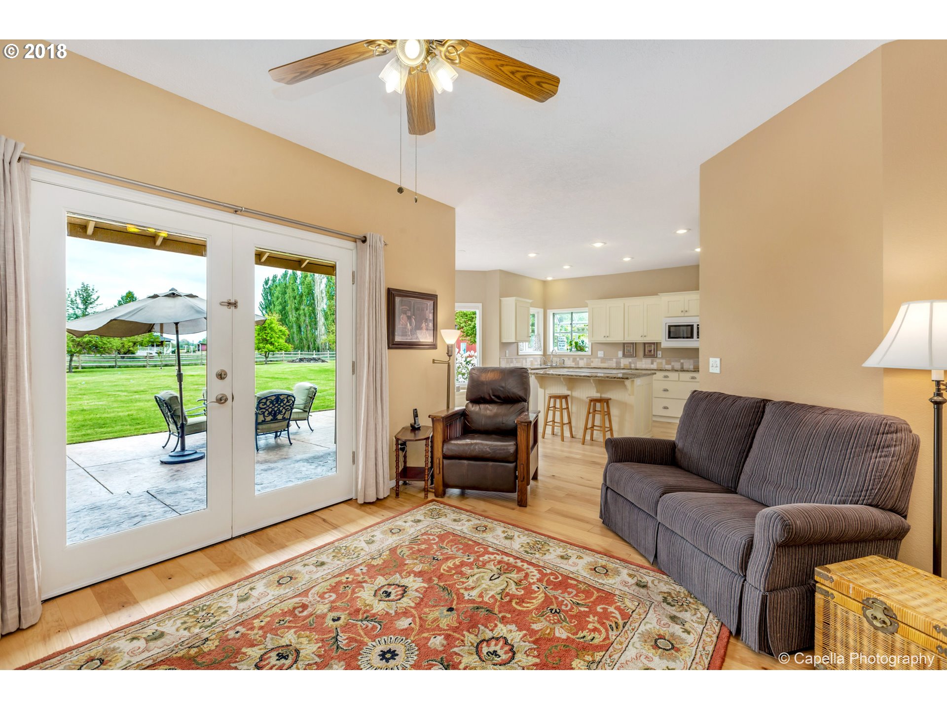 11675 Hazelgreen Road Northeast Silverton, OR 97381 - Photo 13 of 32 a living room with furniture and a large window
