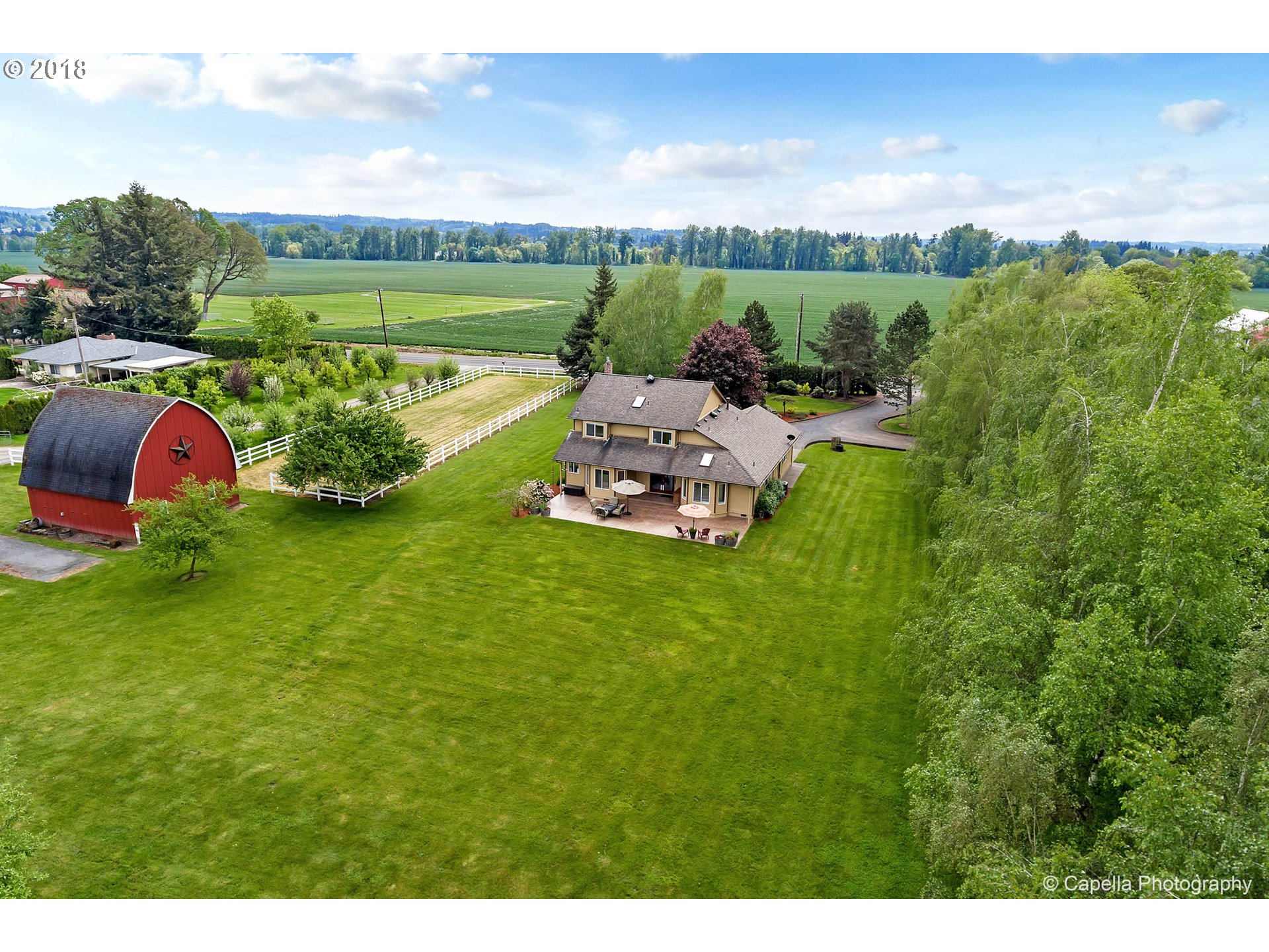 11675 Hazelgreen Road Northeast Silverton, OR 97381 - Photo 28 of 32 a aerial view of a house with a garden