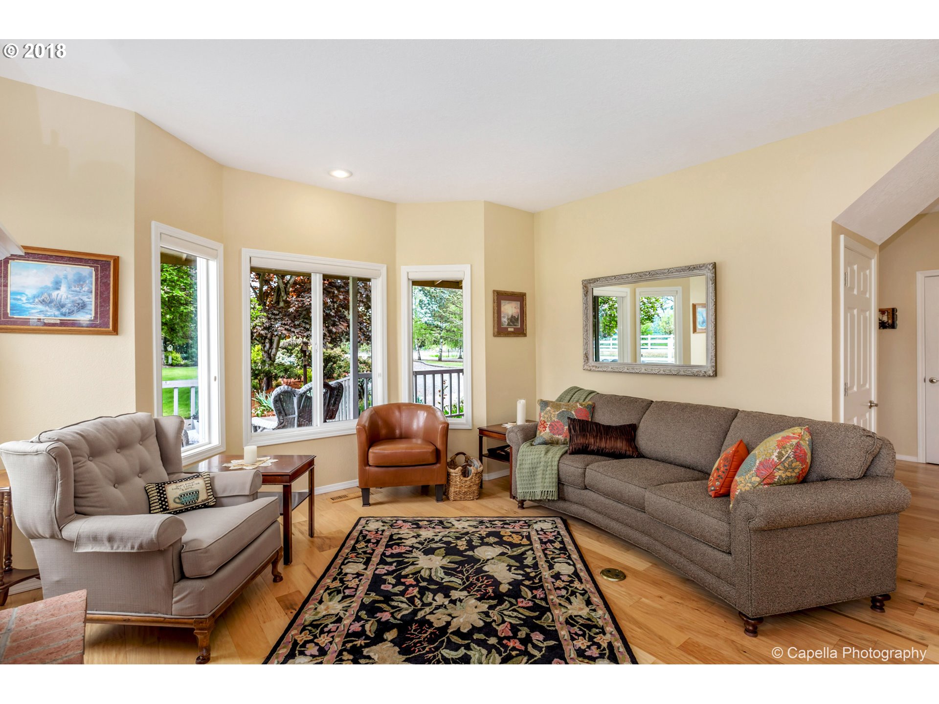 11675 Hazelgreen Road Northeast Silverton, OR 97381 - Photo 5 of 32 a living room with furniture and a large window