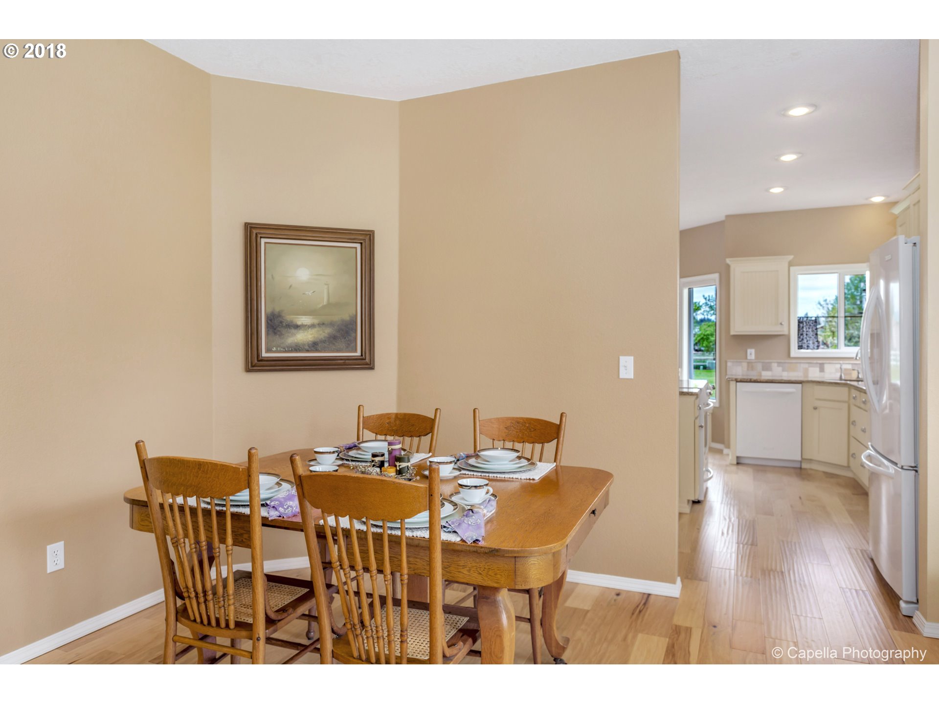 11675 Hazelgreen Road Northeast Silverton, OR 97381 - Photo 7 of 32 a dining room with furniture and wooden floor